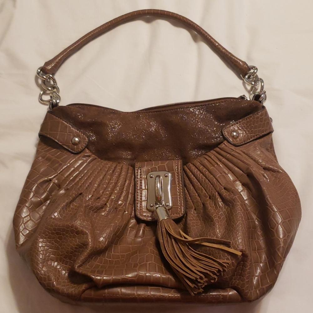 Brown leather hobo style purse by kathy van zeelan
